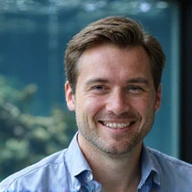 Portrait of Alex Johnson, Lead Marine Biologist at AquaWorld USA.